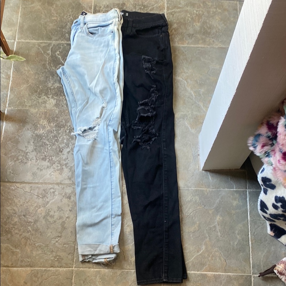 Mens Hollister jeans. Both size 31x32. Black and light colors, both distressed.